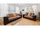 Comfortable living room featuring hardwood floors, natural light, and seating, creating a welcoming atmosphere at 1000 Beckwith Sw St, Atlanta, GA 30314