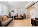 Cozy living room with hardwood floors, natural light, and neutral decor, perfect for relaxation and entertainment at 1000 Beckwith Sw St, Atlanta, GA 30314