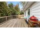 Wood deck with an outdoor grill and a view of the yard at 2327 Ewing Ne Dr, Brookhaven, GA 30319