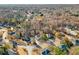 Aerial view of the neighborhood highlighting homes nestled among mature trees and landscaping at 4005 Princeton Trce, Cumming, GA 30041