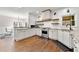 Well-lit kitchen with hardwood floors, stainless steel appliances, and granite countertops at 4005 Princeton Trce, Cumming, GA 30041