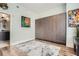 Additional bedroom featuring Murphy bed with built in cabinets and modern decor at 1080 Peachtree Ne St # 1812, Atlanta, GA 30309