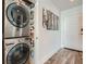 Convenient laundry area with stacked washer and dryer, located near the entryway at 1080 Peachtree Ne St # 1812, Atlanta, GA 30309