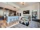 Open concept kitchen and living space with modern finishes, and bar seating at 1080 Peachtree Ne St # 1812, Atlanta, GA 30309