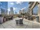 Outdoor patio space with comfortable seating areas and city views, ideal for relaxing or entertaining at 1080 Peachtree Ne St # 1812, Atlanta, GA 30309