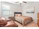 Bedroom with a cozy chair and bedroom set, providing a relaxed space for comfort at 145 Treeside Ter, Fayetteville, GA 30214