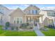 Charming home featuring a covered front porch, manicured lawn and tasteful landscaping enhancing curb appeal at 145 Treeside Ter, Fayetteville, GA 30214