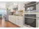 Gourmet kitchen featuring modern appliances and ample counter space for meal preparation and Gathering gatherings at 145 Treeside Ter, Fayetteville, GA 30214