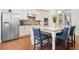 Well-equipped kitchen featuring stainless steel appliances, a center island and ample counter space at 145 Treeside Ter, Fayetteville, GA 30214