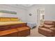 Bright Primary bedroom with a king-size bed and easy access to the ensuite bath at 145 Treeside Ter, Fayetteville, GA 30214