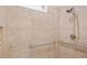 Bathroom features a spacious shower with tile surround, handheld shower head and grab bars at 145 Treeside Ter, Fayetteville, GA 30214