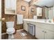 The bathroom features a toilet, vanity, large mirror and shower at 3901 Cherry Ridge Blvd, Decatur, GA 30034