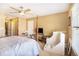 The primary bedroom includes neutral walls, carpeted floors, a ceiling fan and natural light at 3901 Cherry Ridge Blvd, Decatur, GA 30034