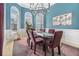 Formal dining area with natural light, modern light fixture, and seating for six at 3901 Cherry Ridge Blvd, Decatur, GA 30034