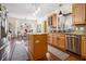 Bright kitchen with hardwood floors, stainless steel appliances, and a view into the breakfast nook at 3901 Cherry Ridge Blvd, Decatur, GA 30034