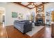 Inviting living room with high ceilings, wood beams, fireplace, and comfortable seating area at 3901 Cherry Ridge Blvd, Decatur, GA 30034