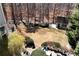 Large backyard with outbuilding and landscaping viewed from the deck of the main house at 539 Wintergreen Way, Canton, GA 30115