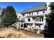 Rear exterior view of the two-story home with a walk out basement and backyard patio at 539 Wintergreen Way, Canton, GA 30115