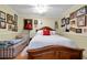 Charming bedroom with hardwood floors, decorative wall hangings, and lots of natural light at 539 Wintergreen Way, Canton, GA 30115