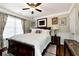 A serene bedroom featuring classic decor and soft, natural light at 539 Wintergreen Way, Canton, GA 30115