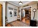 Elegant foyer showcasing hardwood floors and a view into the living spaces at 539 Wintergreen Way, Canton, GA 30115