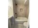 Bathroom featuring white subway tile, shower and pedestal sink at 705 Bridge Se Ln, Smyrna, GA 30082