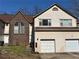 Inviting townhome with a brick accent wall, private entry, and convenient garage parking at 705 Bridge Se Ln, Smyrna, GA 30082