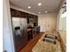 Modern kitchen with granite countertops, stainless steel appliances, and ample cabinet space at 705 Bridge Se Ln, Smyrna, GA 30082