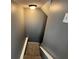 Staircase with gray walls, white trim and carpeted steps at 705 Bridge Se Ln, Smyrna, GA 30082