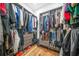 Spacious walk-in closet with custom shelving and ample storage space for clothes, shoes, and accessories at 1147 Oakland Sw Dr, Atlanta, GA 30310