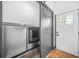 Convenient laundry room featuring modern washer and dryer, ample storage, and easy access to the backyard at 1147 Oakland Sw Dr, Atlanta, GA 30310