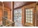 Cozy balcony with brick accents, wood trim, and views of the neighborhood at 1284 Piedmont Ne Ave # 12, Atlanta, GA 30309
