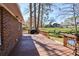 Wooden back deck with grill offering outdoor entertaining and scenic views at 2780 Eastfield Se Rd, Smyrna, GA 30080