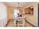 Bright dining room featuring a wood table, natural light, and views to the kitchen at 2780 Eastfield Se Rd, Smyrna, GA 30080