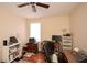 Bedroom repurposed as home office space, features a ceiling fan and lots of room for storage at 2780 Eastfield Se Rd, Smyrna, GA 30080