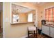 Breakfast bar area connecting to dining room in the kitchen at 2780 Eastfield Se Rd, Smyrna, GA 30080