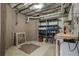 Unfinished basement featuring walls, ceiling, shelving, storage and a small workbench at 348 Lauren Ln, Woodstock, GA 30188