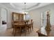 Elegant dining room features hardwood floors, recessed lights, and ample natural light at 348 Lauren Ln, Woodstock, GA 30188