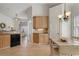 Bright eat-in kitchen featuring granite countertops, stainless steel appliances, and hardwood floors at 348 Lauren Ln, Woodstock, GA 30188