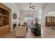 Bright living room with hardwood floors, fireplace, and built-in shelving creating a warm atmosphere at 348 Lauren Ln, Woodstock, GA 30188