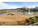 Scenic pond view with a charming gazebo and well-manicured landscaping in a tranquil community setting at 348 Lauren Ln, Woodstock, GA 30188