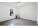 Room featuring tile floor, a window for natural light, and neutral walls at 348 Lauren Ln, Woodstock, GA 30188