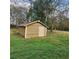 Exterior view of outbuilding on property with single entry door at 582 S Cherokee Rd, Social Circle, GA 30025