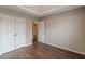 An airy bedroom with a tray ceiling, closet and adjoining bathroom provides a private retreat at 105 Kentwood Springs Dr, Hampton, GA 30228