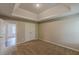 A tranquil bedroom with neutral carpeting and a closet offers a peaceful sanctuary at 105 Kentwood Springs Dr, Hampton, GA 30228