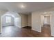 Bonus room features wood-look flooring and multiple doorways, offering flexible space for any lifestyle at 105 Kentwood Springs Dr, Hampton, GA 30228