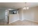 Bright dining area featuring tiled floors and an elegant chandelier at 105 Kentwood Springs Dr, Hampton, GA 30228