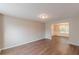 Open-concept living space features durable floors, neutral paint, and natural light at 105 Kentwood Springs Dr, Hampton, GA 30228