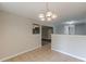 Cozy living room boasting great lighting at 105 Kentwood Springs Dr, Hampton, GA 30228