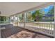 Covered porch offers ample space and nice views of the surrounding neighborhood at 116 Tallapoosa St, Temple, GA 30179